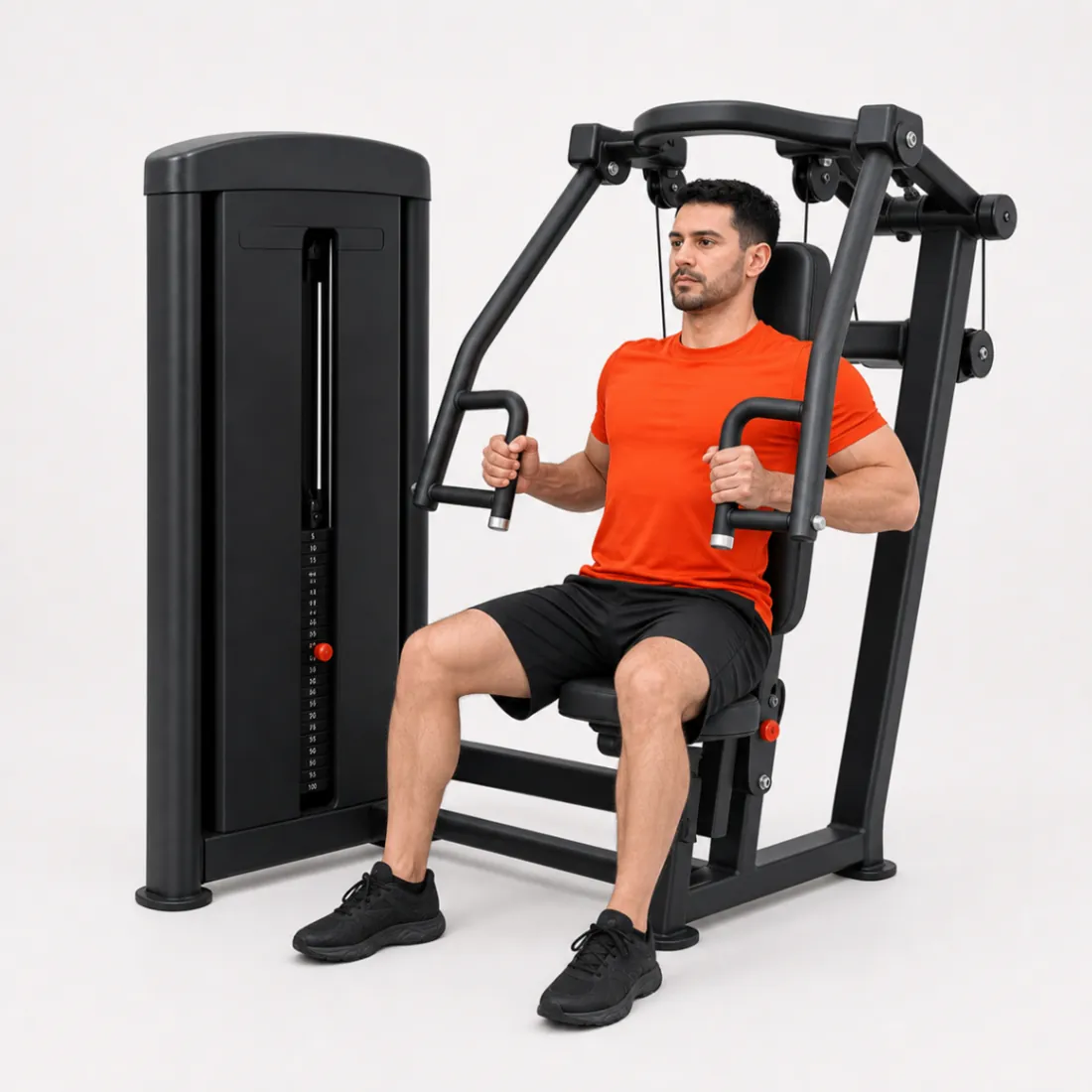 Man in an orange T-shirt on a chest press machine